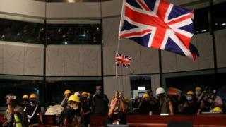 A British flag is seen inside the council building