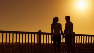 Man and woman in silhouette