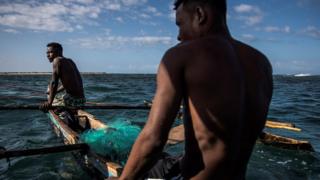 Fishermen on a boat.