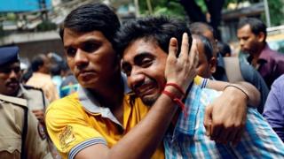 A relative of a stampede victim grieves at a hospital in Mumbai, India September 29, 2017