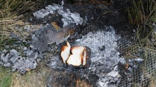 Bread on burnt out barbecue