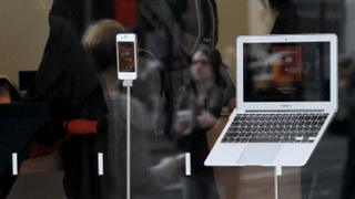 Apple's laptop and iPhone