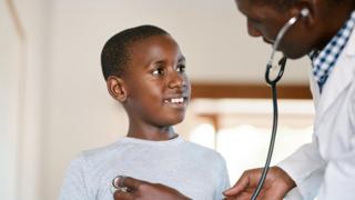 A boy seeing a doctor