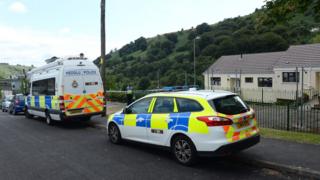 Police outside house in Elliot Town