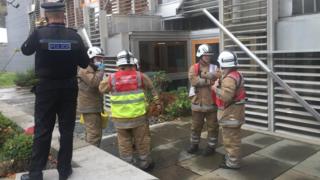 police and firefighters at Holyrood