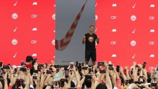 Cristiano Ronaldo gestures as fans take pictures of him during an event organized by Nike. Photo file