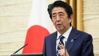 Japanese Prime Minister Shinzo Abe speaks during a press conference at the PM's office in Tokyo on 14 May, 2020