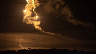 Flares light up the sky over the Gaza Strip