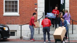 Students move out of dorm rooms on the campus of Harvard University last month