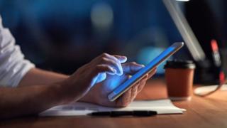 Man using tablet computer