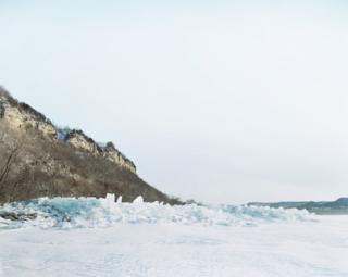 An icy river landscape.