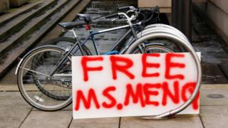 A sign in support of Huawei CFO Meng Wanzhou is displayed outside of the B.C. Supreme Court bail hearing of Meng, who is being held on an extradition warrant in Vancouver, British Columbia, Canada December 10, 2018.