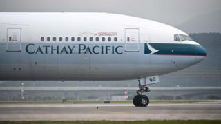 A Cathay Pacific passenger aircraft prepares to take off from Hong Kong International Airport on March 13, 2019