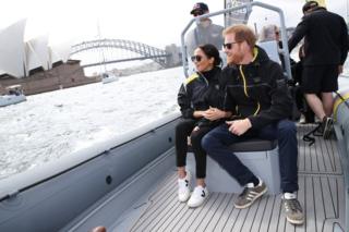 Prince Harry, The Duke of Sussex and Meghan, The Duchess of Sussex watch the Sydney Opera House and the Harbor Bridge Bridge on the second day of the Sydney Invictus Games 2018 at the Sydney Olympic Park in Sydney, Australia on October 21 2018