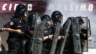 Neo-fascist groups, extremists and ultras from Italy's football clubs clash with police as they demonstrate over the government"s handling of the coronavirus emergency, on 6 June 2020 at Circus Maximus in Rome
