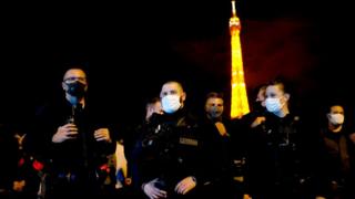 French police officers protest at Trocadero square in front of the Eiffel Tower in Paris on June 14, 2020, in reaction to the French Interior Minister's latests announcements following demonstrations against police violence