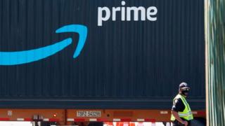 An Amazon Prime delivery truck drives through the Port of Los Angeles and Long Beach, California.