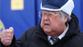 Тулеев в шапке
