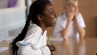 School girl laughing