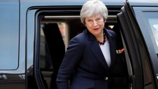 Theresa May leaves after a meeting with French President Emmanuel Macron to discuss Brexit on Tuesday at the Elysee Palace in Paris,