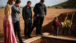 LeBaron community members at a funeral for one of the victims