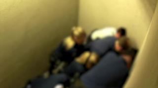 A blurred image shows police holding down Jozef Chovanec after his arrest at Charleroi