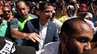 Venezuela's opposition leader Juan Guaidó (centre) at a rally in Caracas. Photo: 12 February 2019
