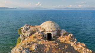 A bunker on a cliff next to the sea in Albania