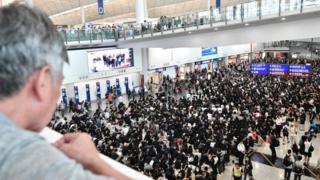 Scenes From   airport,  activists GaTherer on 9 August