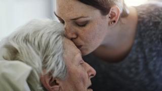 Daughter visiting her mother