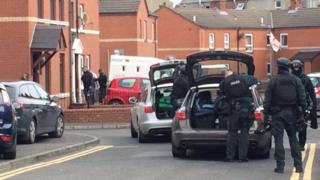 Armed police were seen outside a house in the Frank Street area of east Belfast on Friday