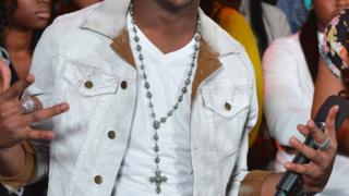 Person wey wear Crucifix