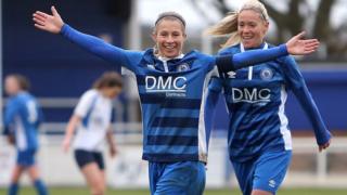 Lindsey Morgan celebrates with Zoe Rushen