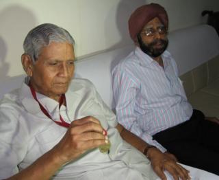 Ajit Singh Singhvi, left, received his gold medal on Thursday