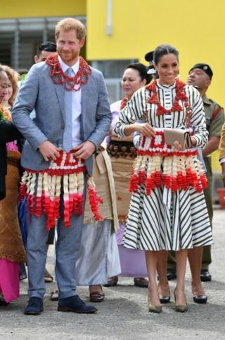 Harry and Meghan wearing traditional Tongan jewellery