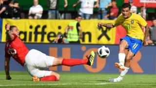 Brazil's midfielder Philippe Coutinho Correia scores the third goal for Brazil during the international friendly footbal match Austria on 10 June