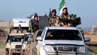 Turkish forces and Members of the Turkish-backed Free Syrian Army about 10km away from Manbij town in northern Syria, 29 December 2018