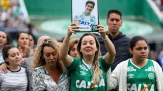 Family and supporters paying tribute to the players
