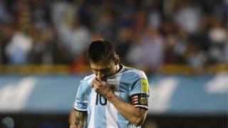 Lionel Messi reacts after Argentina's draw against Peru