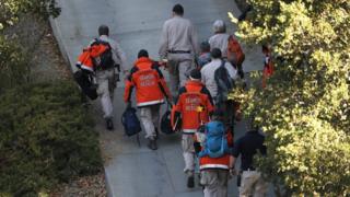 Contra Costa County Sheriff Search and Rescue crew walk up the driveway towards the scene of a shooting at a Halloween Party in short-term rental house in Orinda, California, USA, 01 November 2019.