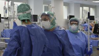Doctors treating coronavirus patients in Brescia, Italy