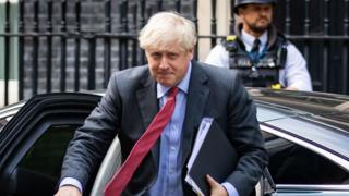 Boris Johnson arriving back at Downing Street