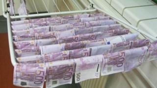 thousands of euros drying near a radiator - 7 December 2015