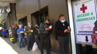 People line up while waiting to be treated at a private hospital in Mexico City, Mexico, 05 May 2020.