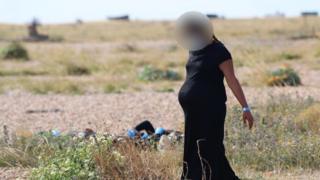 Migrants on Dungeness beach