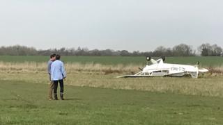beccles crash aircraft light airfield plane lands passenger flipped unharmed landing pilot caption were its over but