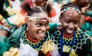Young traditionally clad Zulu maidens arrive at The Moses Mabhida Football Stadium in Durban on 7 October 2018.