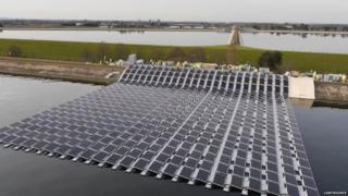 Solar photovoltaic panels are being laid on the surface of the Queen Elizabeth II reservoir near Walton-on-Thames, England