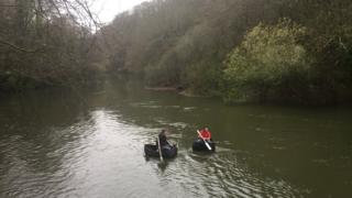 Coracle fishermen on the river