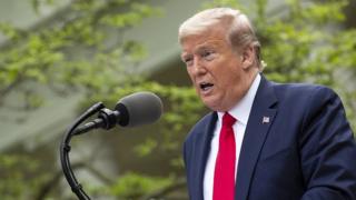 US President Donald Trump delivers remarks during a news conference in the Rose Garden of the White House in Washington, 14 April 2020